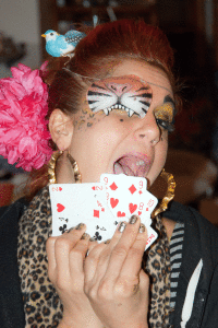 pretty girls from Bass Line Circus Team play cards in eridu bed and breakfast